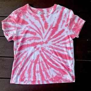 Pink tie dye t shirt. embroidered skateboard on left side brand:Vans size:small